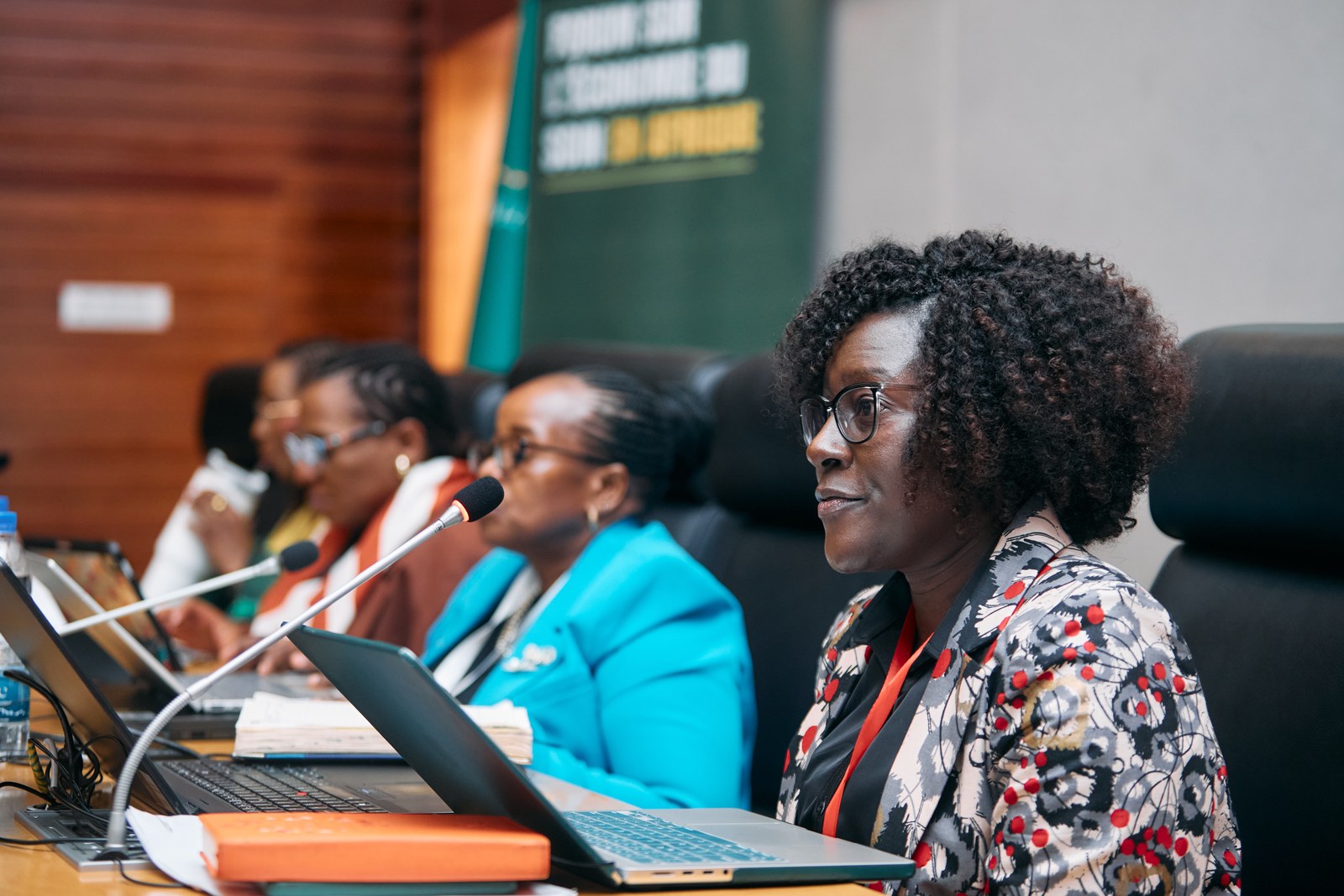 Delegates in discussion during a technical session at the Africa Care Forum
