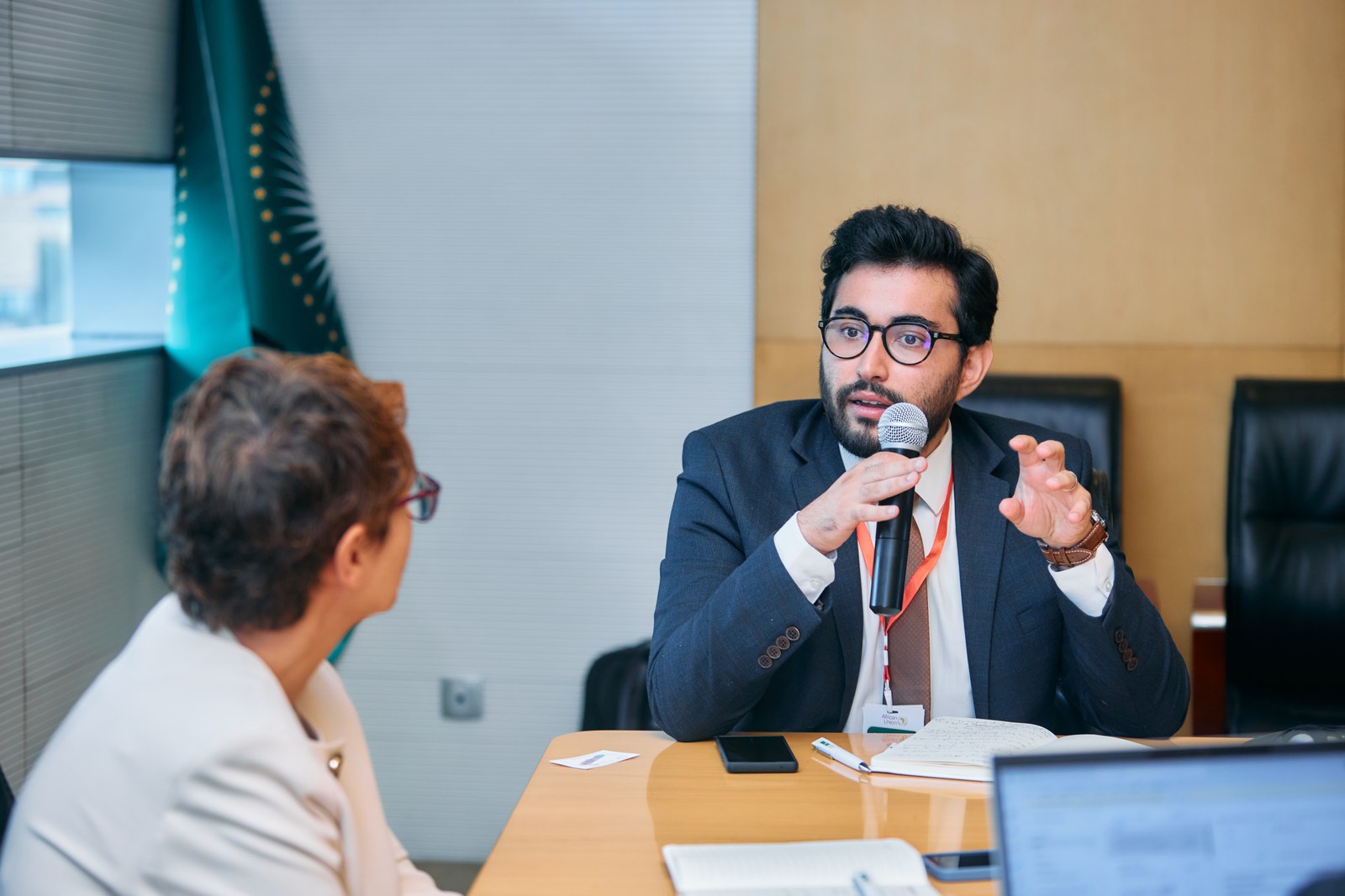 Expert making an intervention during a technical session at the Africa Care Forum