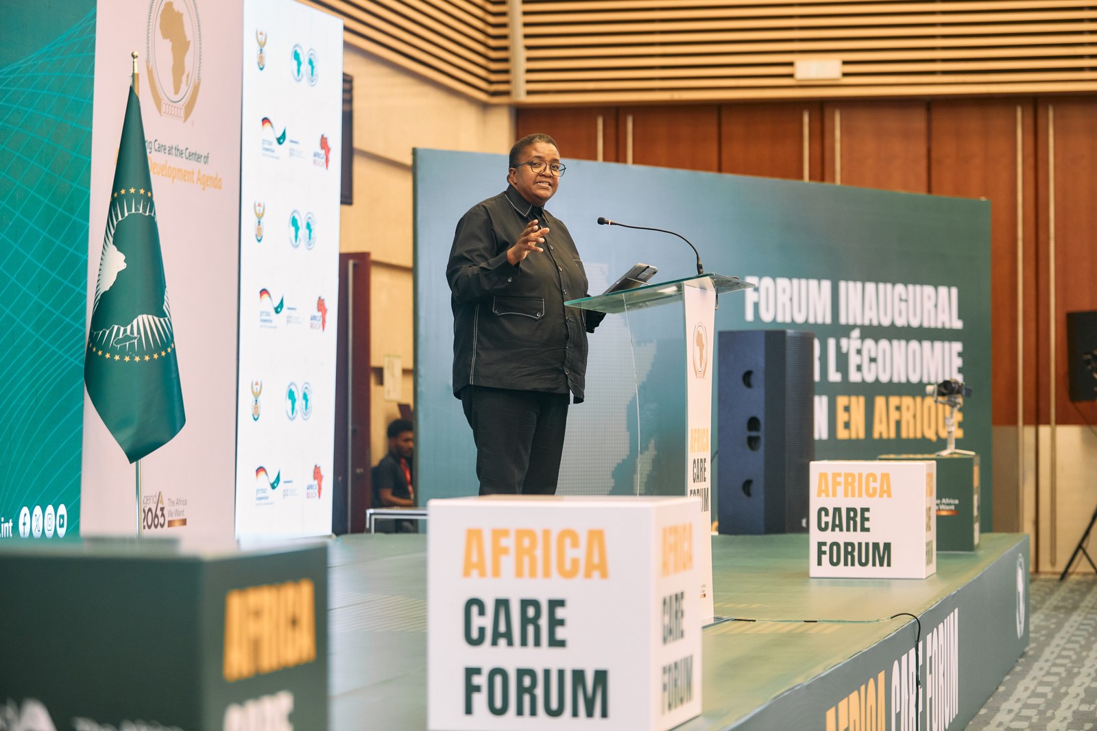 Speaker delivering an address at the Africa Care Forum opening ceremony in Addis Ababa