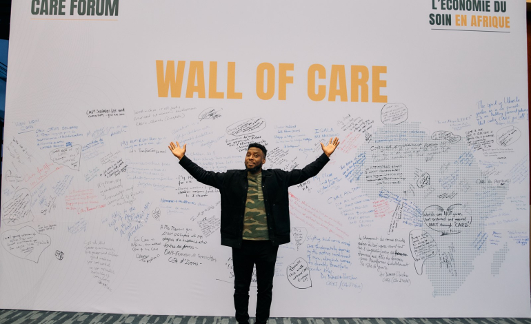 The completed Wall of Care at the African Union Commission, covered in handwritten messages from Africa Care Forum delegates