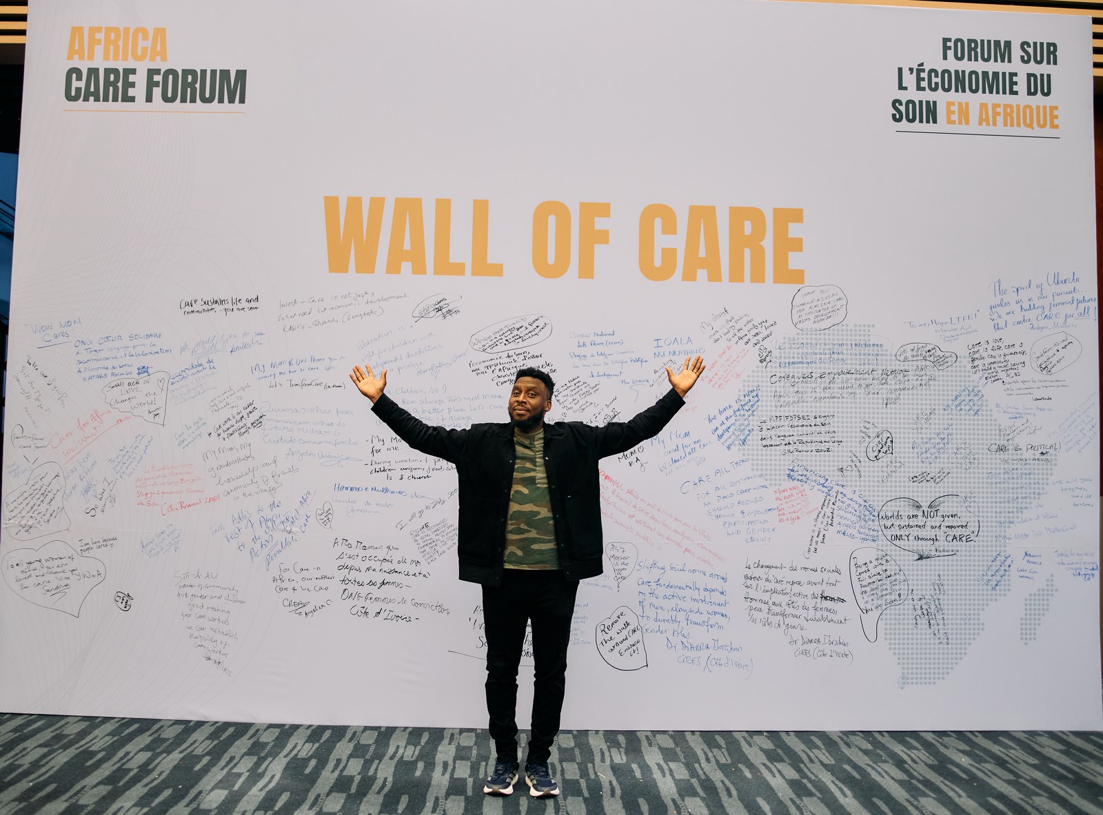 The completed Wall of Care at the African Union Commission, covered in handwritten messages from Africa Care Forum delegates